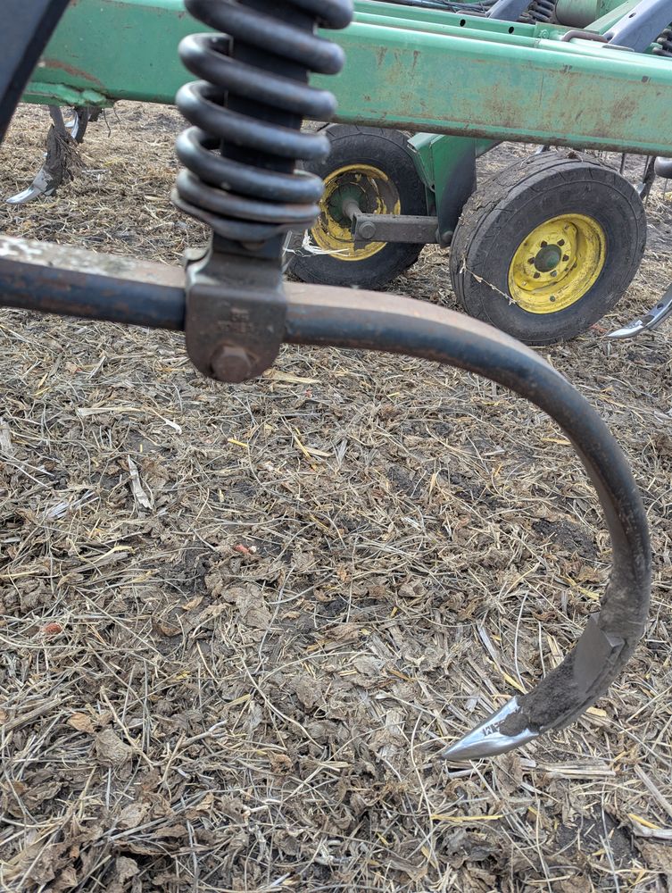 Close-up of a chisel plow shank, spring, and point